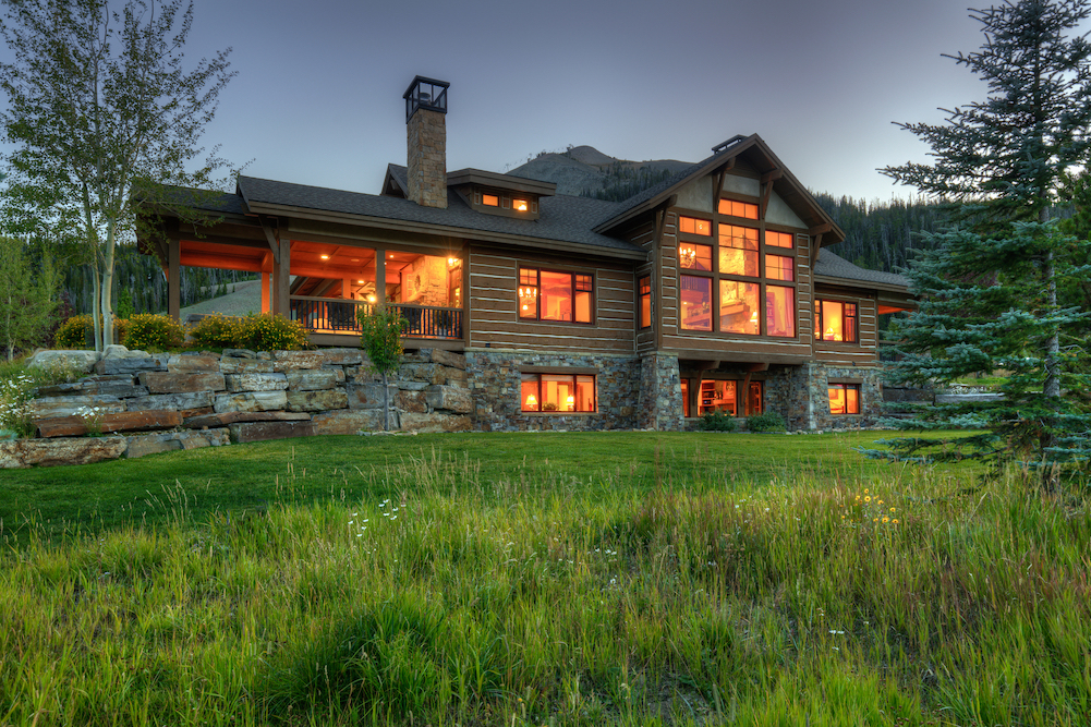 montana log cabin at dusk