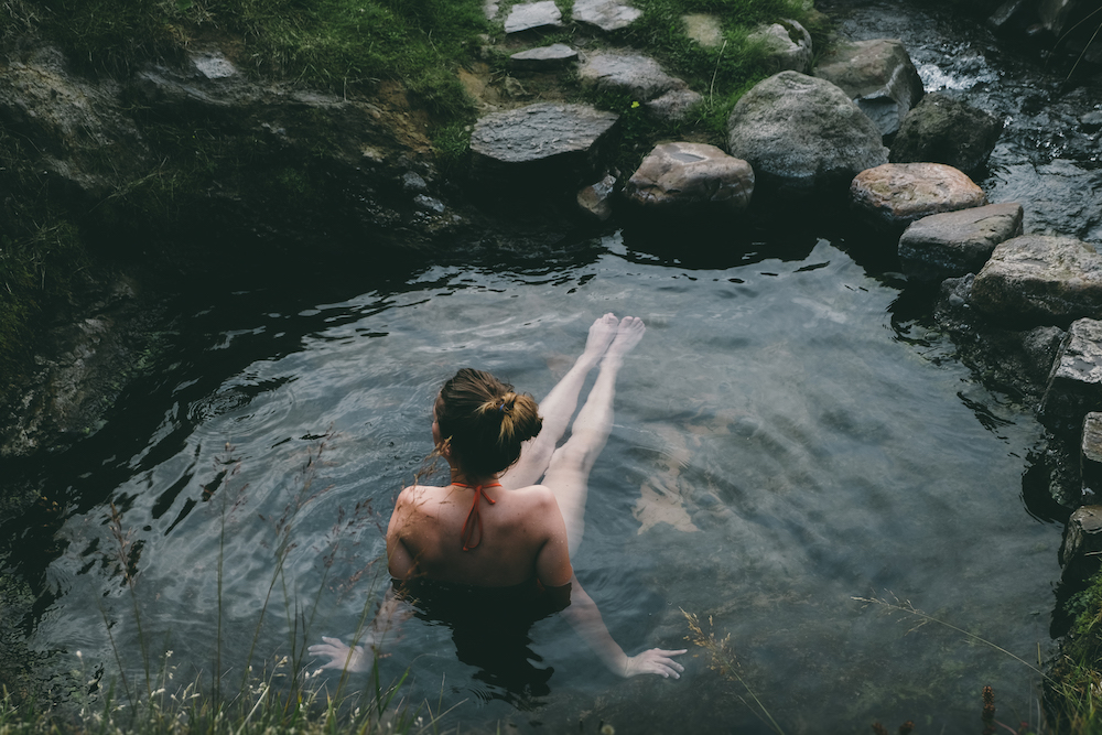 Woman soaking in a hot tub